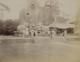 Four tourists with Japanese citizens in front of the Daibutsu (Great Buddha) of Kōtoku-in. Kamakura,...