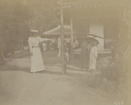 Western woman pointing at Japanese children. Kamakura, Kanagawa Prefecture, Japan, from a Travel...