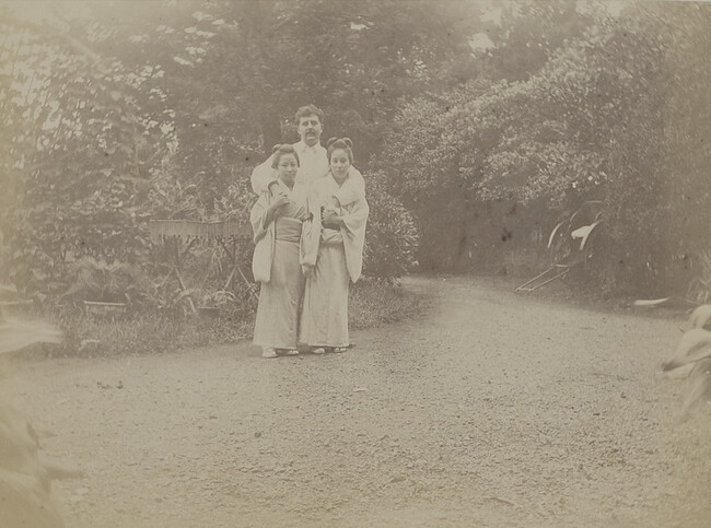 Western man with two Japanese girls. Yokohama, Kanagawa Prefecture, Japan, from a Travel Photograph Album (Views of Hawaii and Japan)