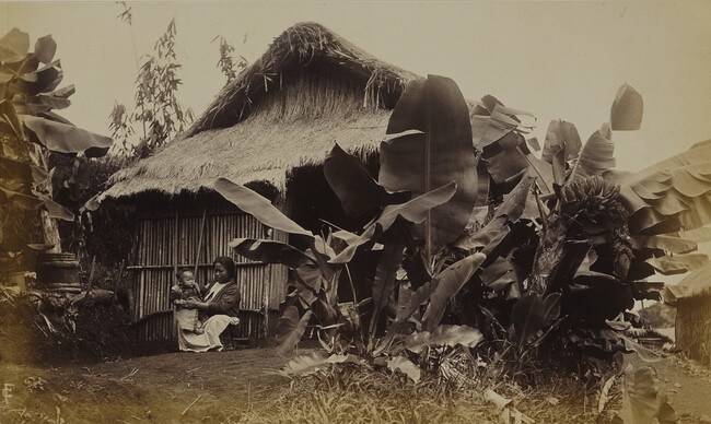 Woman and child in front of a Japanese house. Hilo, Hawaii (island), Hawaii, from a Travel Photograph Album (Views of Hawaii and Japan)