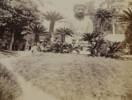 Western tourists at Kōtoku-in with the Daibutsu (Great Buddha) in the background. Kamakura, Kanagawa...