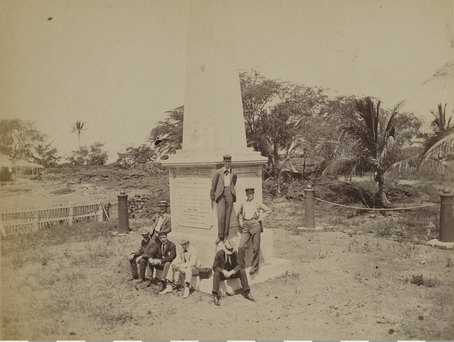 Seven men at the Captain Cook Monument. Kealakekua Bay, Hawaii (island), Hawaii, from a Travel Photograph Album (Views of Hawaii and Japan)