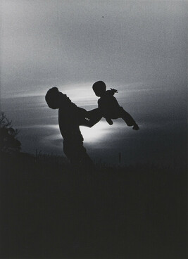 Father Swings Son in Sunset, Tuskegee, Alabama