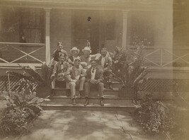Men sitting on a porch (