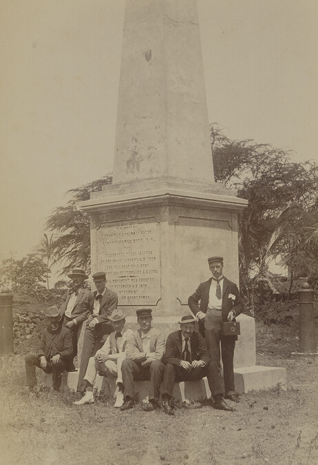 Seven men at the Captain Cook Monument. Kealakekua, Hawaii (island), Hawaii, from a Travel Photograph Album (Views of Hawaii and Japan)
