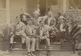 Men sitting on a porch (