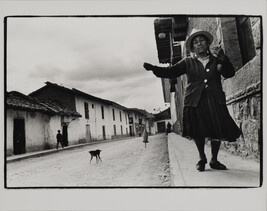 Urubamba, Peru (A Woman Spinning Wool as She Walks down a Street)
