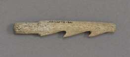 Fragment of bone projectile point with two side barbs