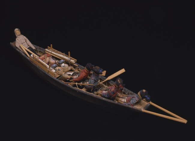 Souvenir Model Umiak with Four Women, One Man, a Dog, and Camp Equipment