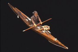 Souvenir Model Kayak with Paddler and Seal Hunting Equipment