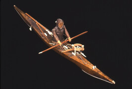 Souvenir Model Kayak with Paddler and Seal Hunting Equipment