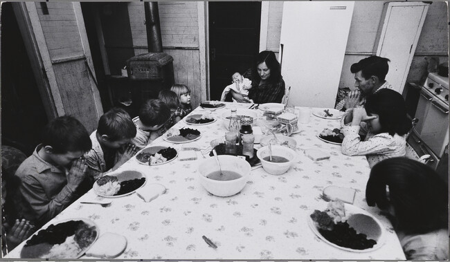 Family Saying Grace at the Table, United States