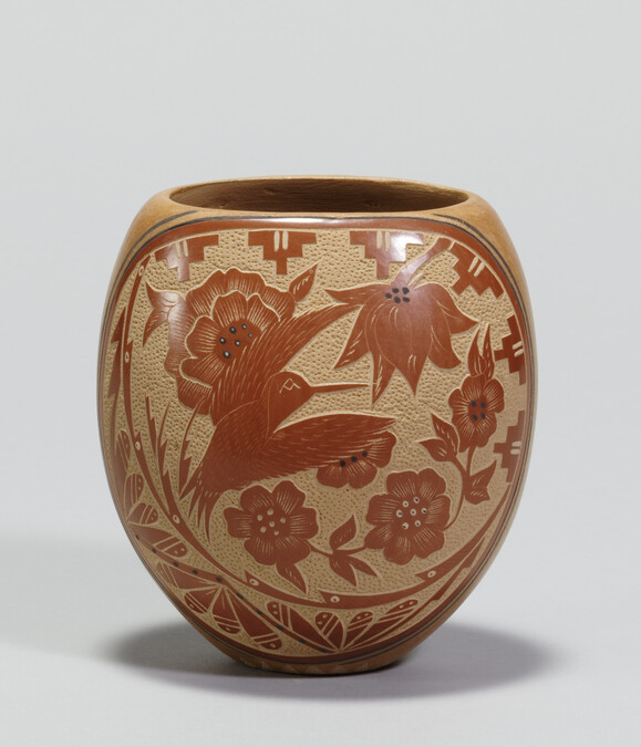 Carved Jar depicting a Hummingbird