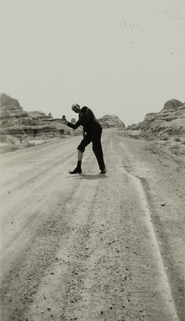 Man Hitchhiking with Pant Leg Raised [reference to: It Happened One Night; Claudette Colbert Hitchhiking...