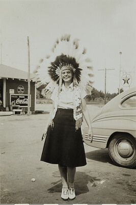 Young Woman with Plains-style Headdress and Beaded Vest