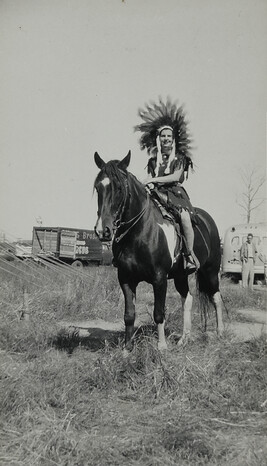 Young Woman on Horseback wearing Plains-style Headdress
