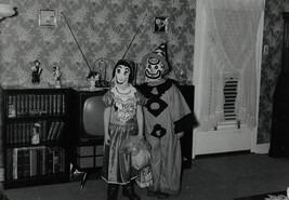 Two Children in Halloween Costumes