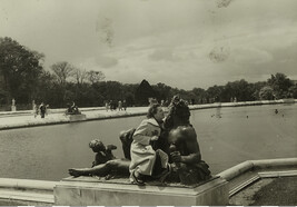 Woman Sitting on the Lap of a Male River Statue
