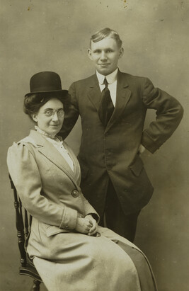 Man with Woman Wearing Man’s Hat