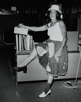 Figure Dressed in Skirt and High Heels, Hat, and Wig