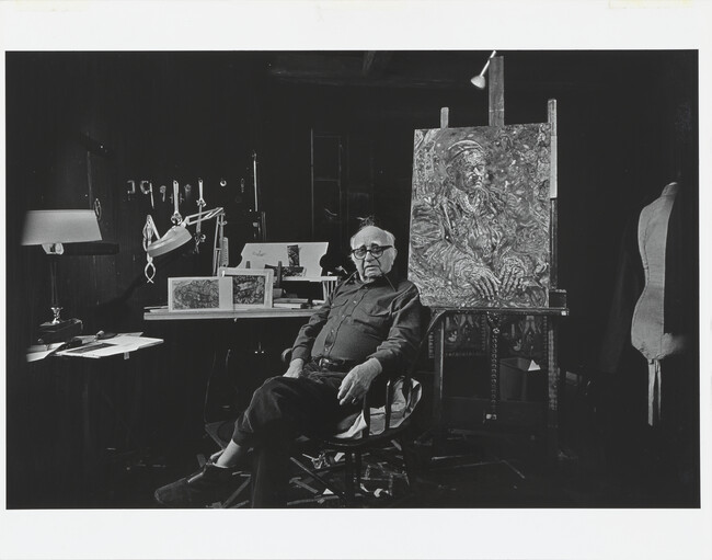 Ivan Albright in his Studio with his painting 