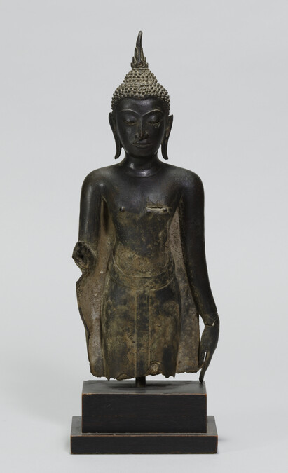 Standing Buddha wearing Monks Robes